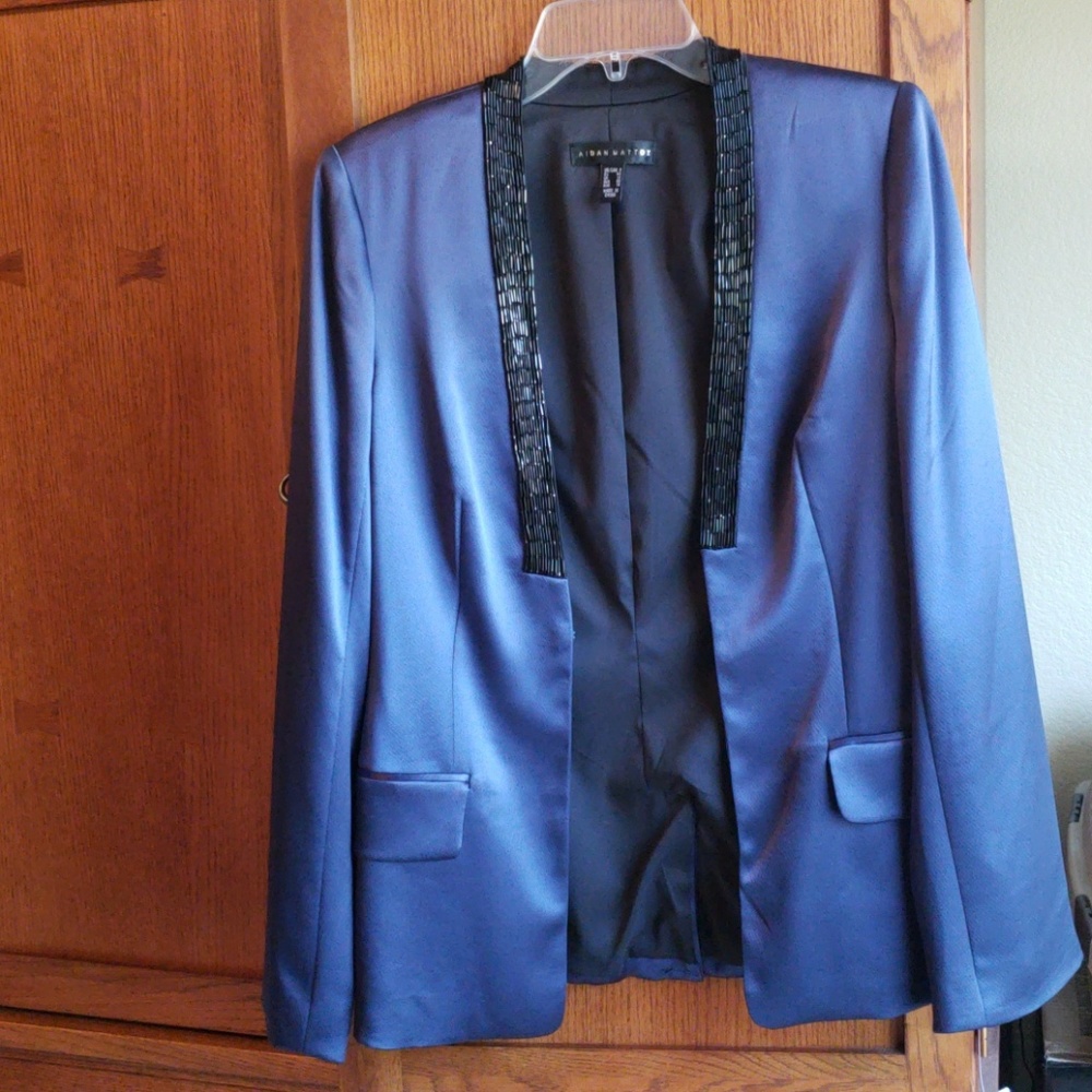 100% silk with polyester lining jacket